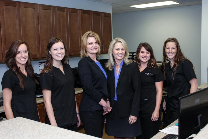 A group of women standing next to each other for a corporate photography by Nashville Corporate Media